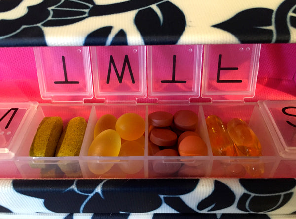 The Style Rx designer pill box case from Inspired by Dawn can hold 6 fish oil capsules and 20 ibuprofen tablets per day.
